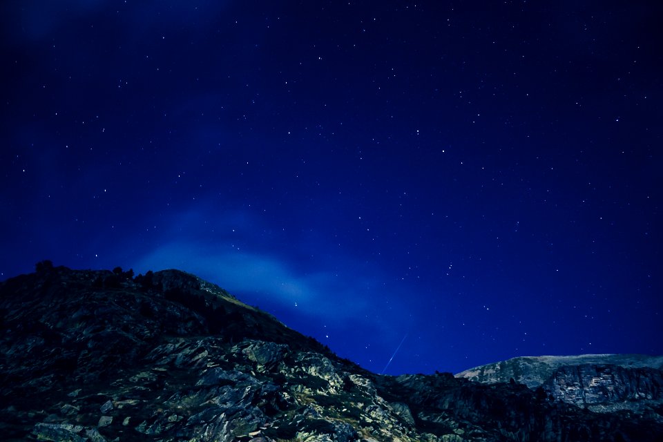 low angle photography of mountain during nighttime