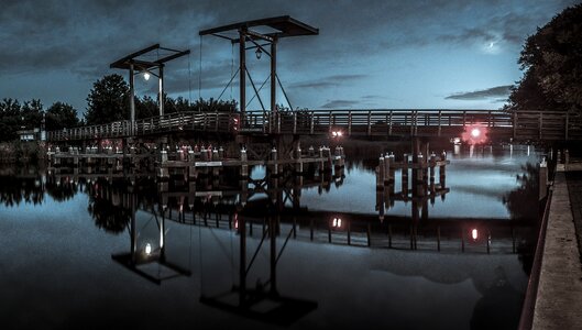 Drawbridge setting sun water