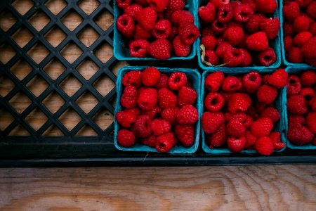 bunch of strawberries in containers