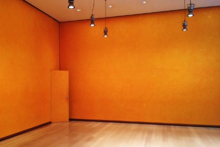 room with turned on ceiling lights
