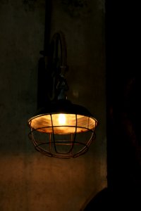 brown sconce with lights on photo