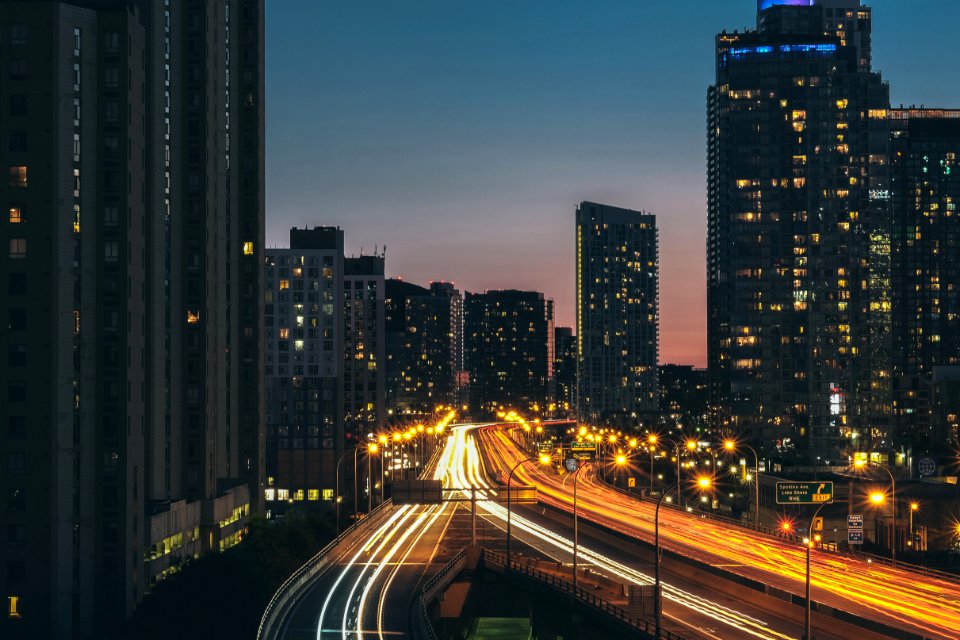 time lapse photography of highway during nighttime photo
