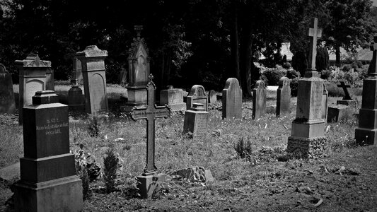Cross abandoned tombstone