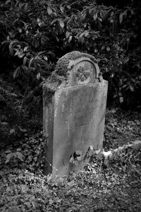 Cross abandoned tombstone