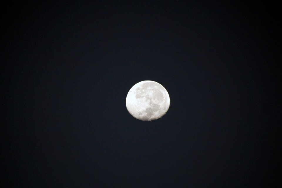 Blue cloud full moon