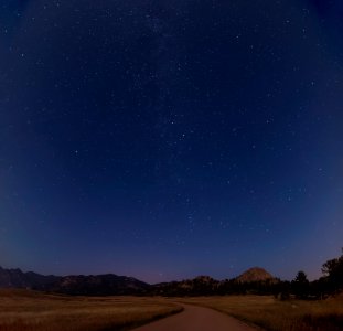 brown pathway under starry night photo