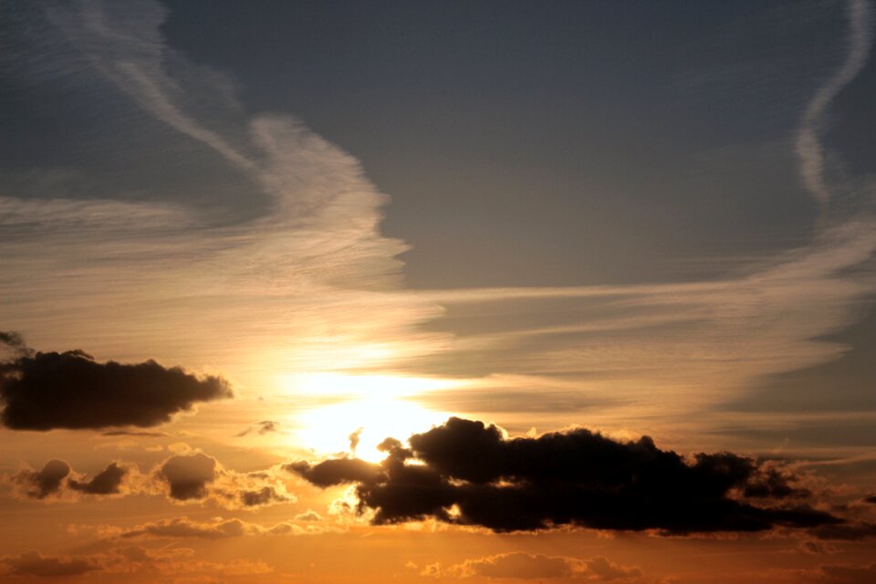 Dark clouds bright cloud contrail