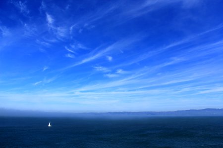 blue sea and sky horizon photo