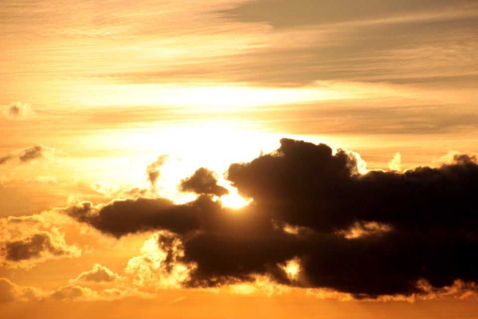 Dark clouds bright cloud contrail photo