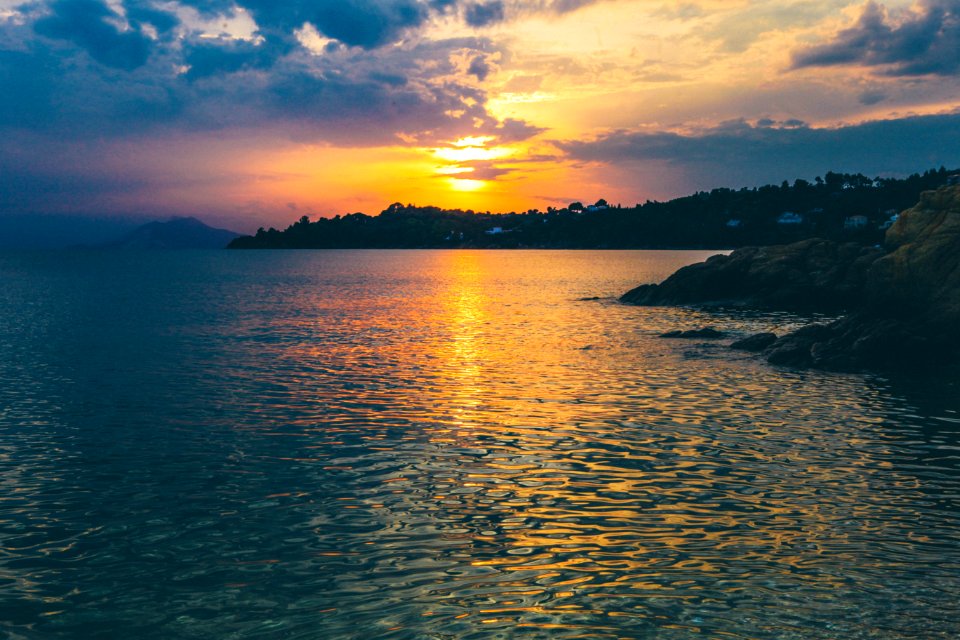 body of water beside shore