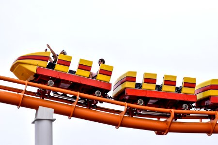 people riding on rollercoaster photo