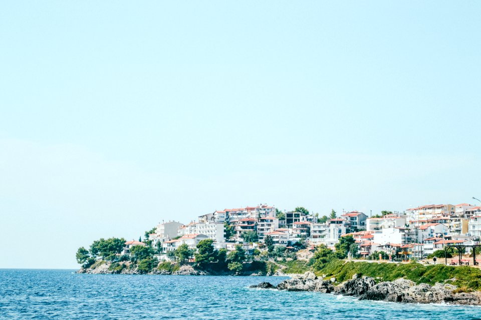 high rise buildings near cliff
