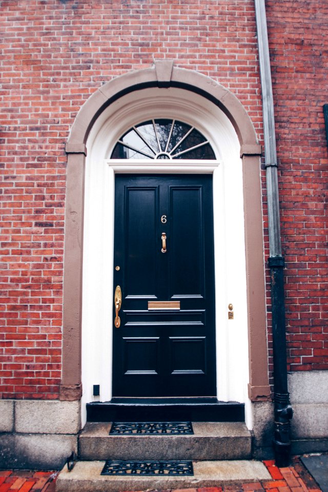 black wooden door in a building close-up photography photo