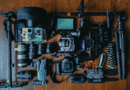 flat lay photography of cameras and camera gear photo