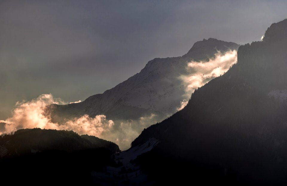 mountain under gray sky