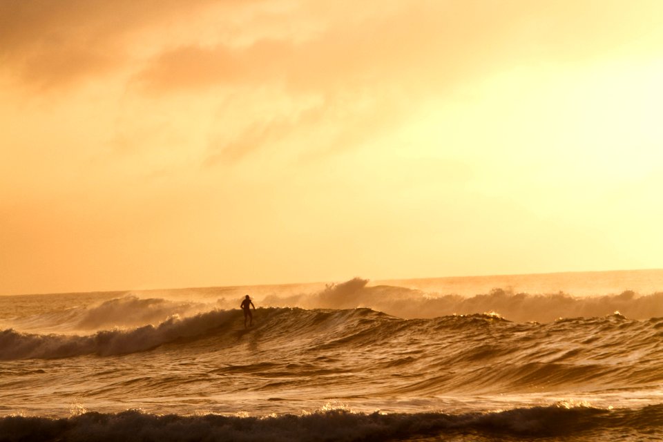 Large waves coming in during sunset.