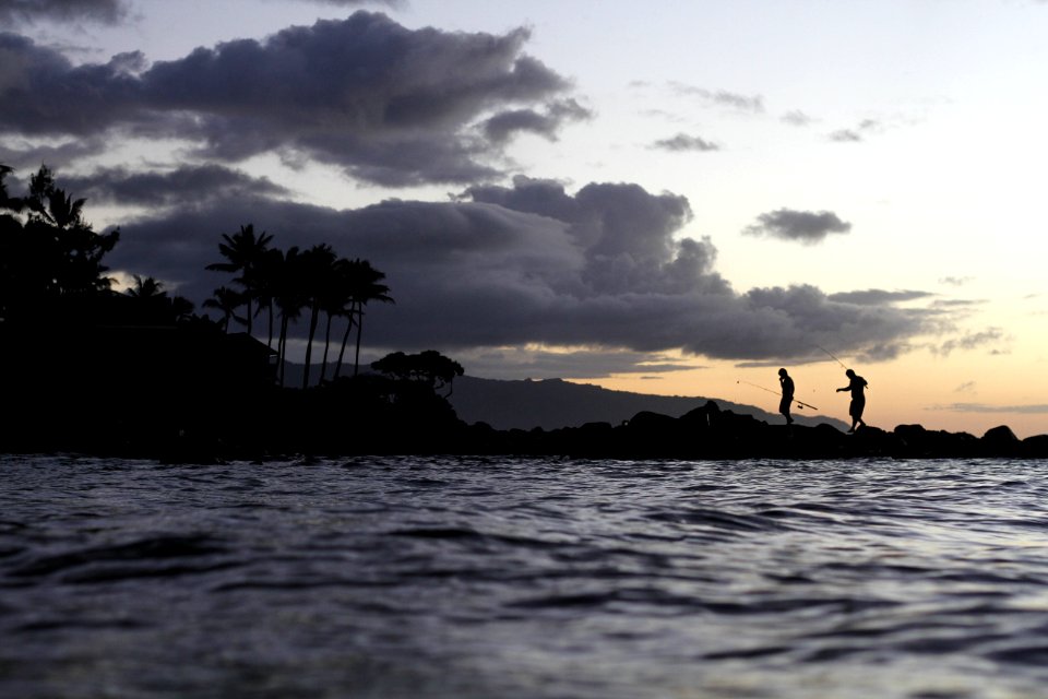 People out in the ocean in Hawaii.