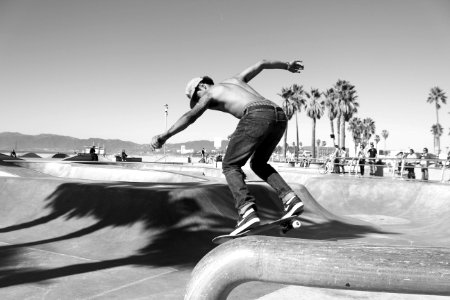 man skateboarding on ramp photo