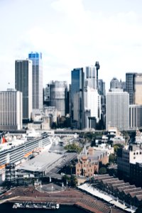 white and black high buildings at daytime