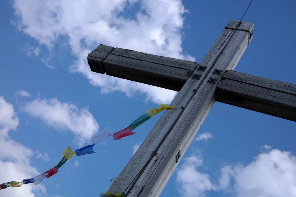 Top of pools allgäu alps wooden cross
