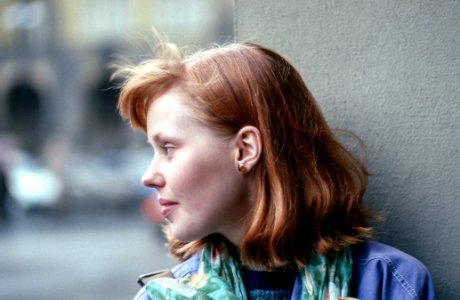 close-up photography of woman looking outside