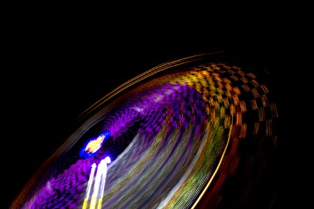 time lapse photography of multicolored amusement ride