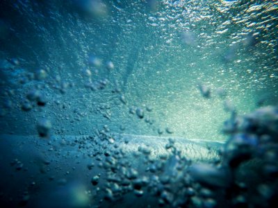 A bit of bubbling near the surface, taken underwater.