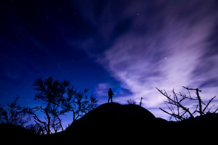 silhouette of a person on mountain hill