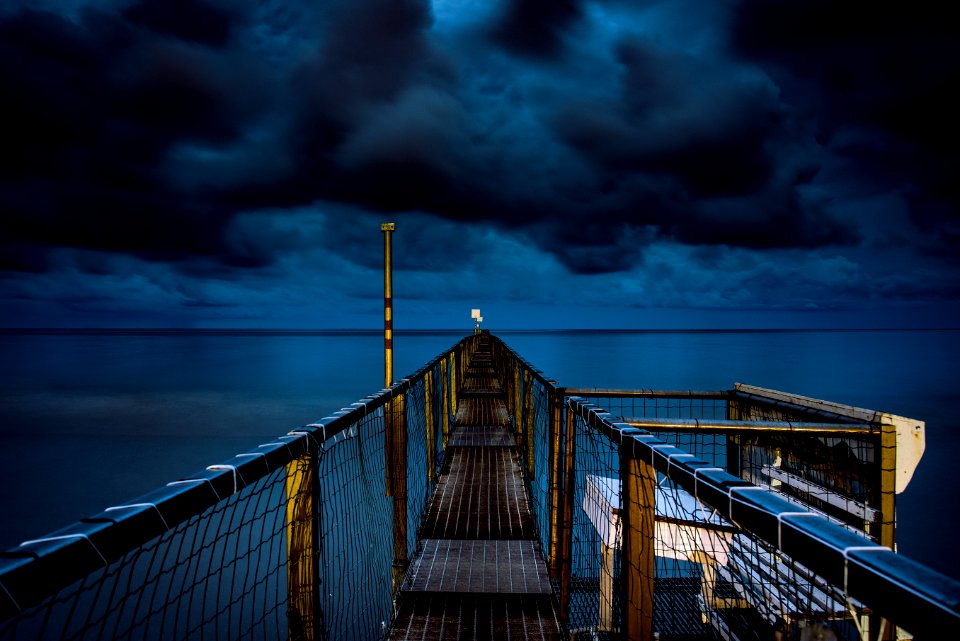 photo of bridge with fence