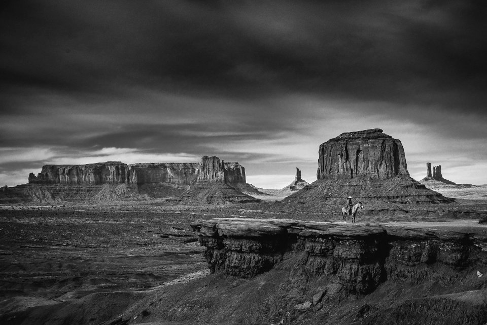 grayscale photo of rock formation