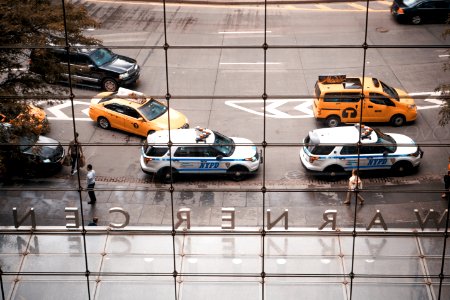 two parked NYPD vehicles photo