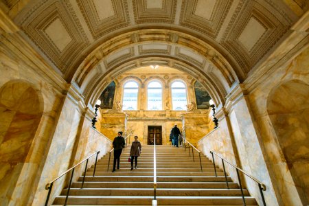 people walking on staircase photo