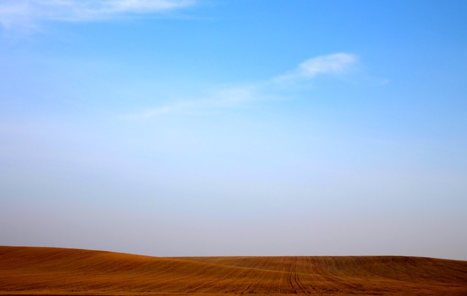 sand dunes under clear sky