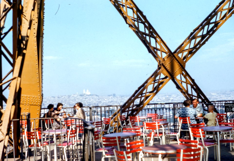 six person sitting on top of building