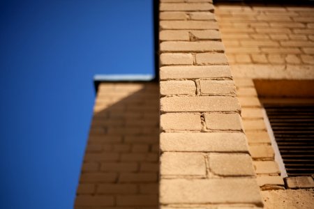 tilt photography of wall bricks photo