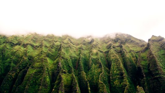 green curved mountaing photo
