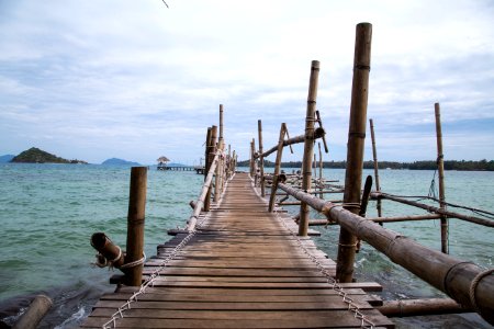 brown wooden dock on sea during daytime photo