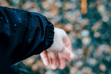 person wearing black jacket photo