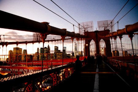 people standing on Brooklyn Bridge photo