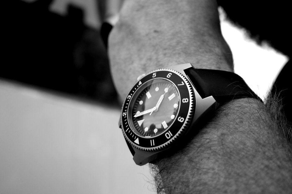 grayscale photography of analog watch