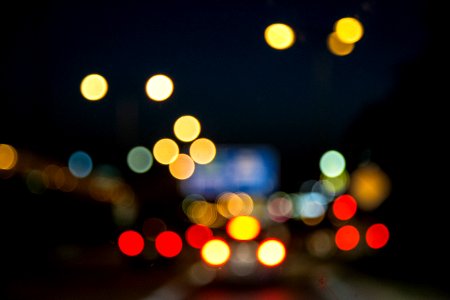 bokeh photography of city lights during night time photo