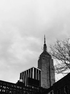 grayscale photo of high-rise building photo