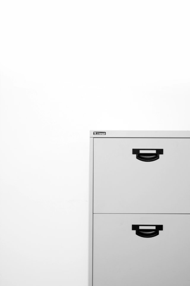 gray metal locker on white surface photo