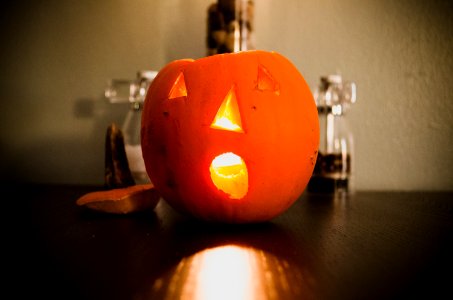 jack-o-lantern on table photo