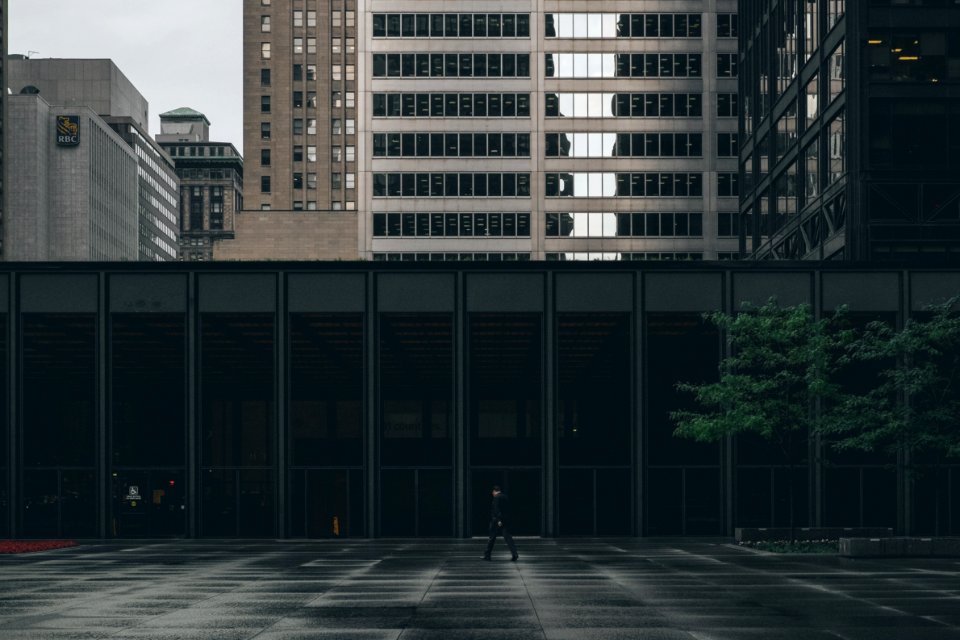 person walking near building during daytime