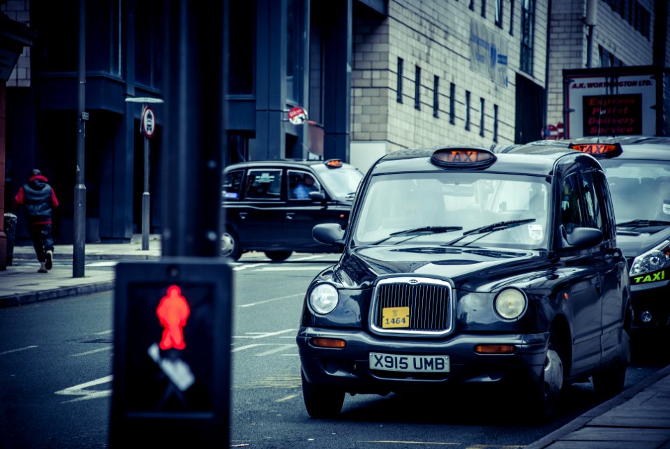black 5-door hatchback on road
