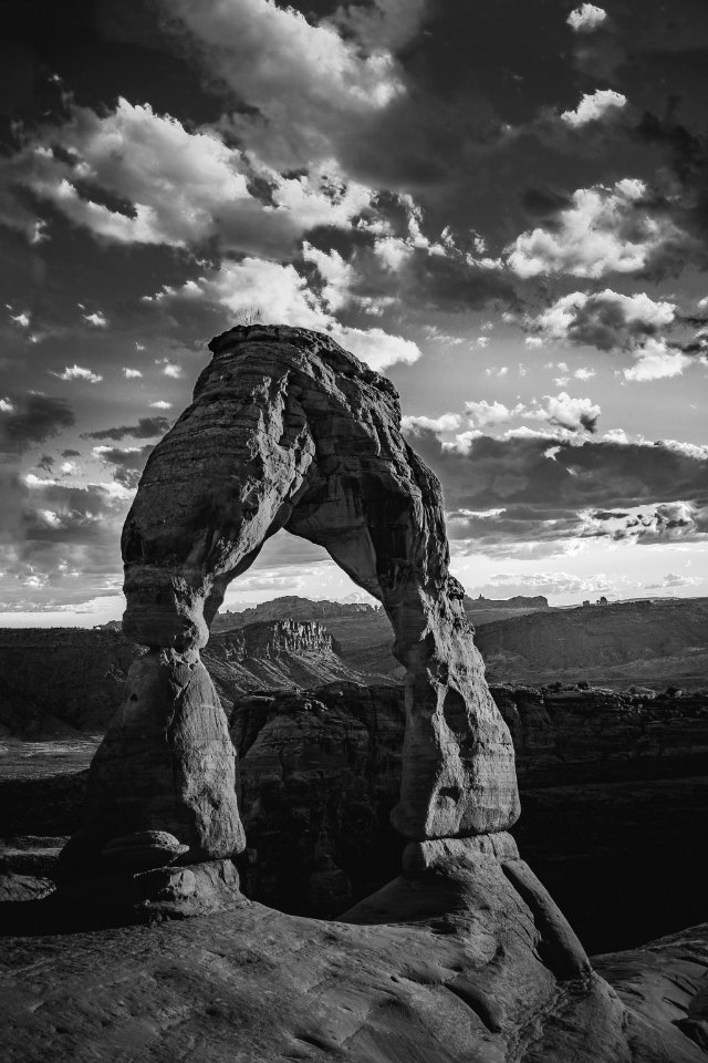 grayscale photo of rock formation photo