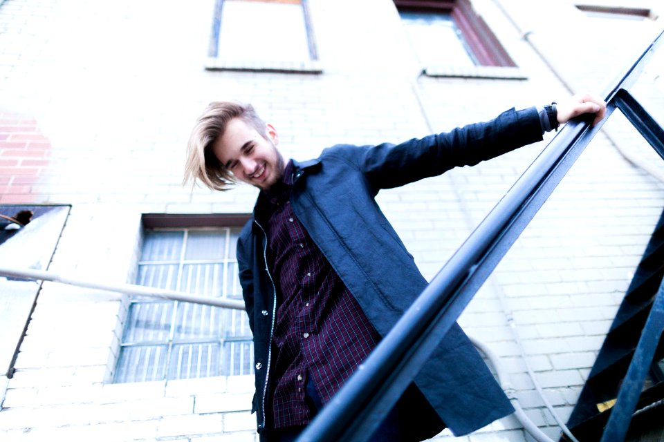 man standing on stairs