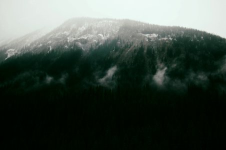 mountain under cloudy sky photo