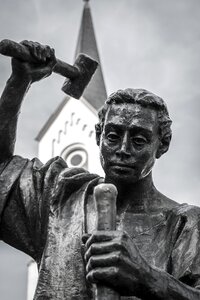Man statue hammer photo